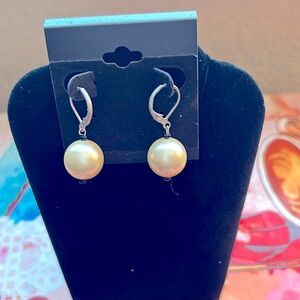 Faux pearl ball shaped earrings. Pierced.